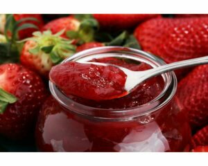 strawberry jam on a spoon